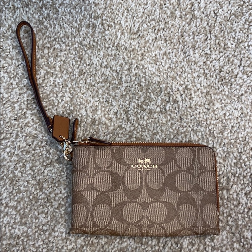 Brand new - never used Coach wristlet wallet